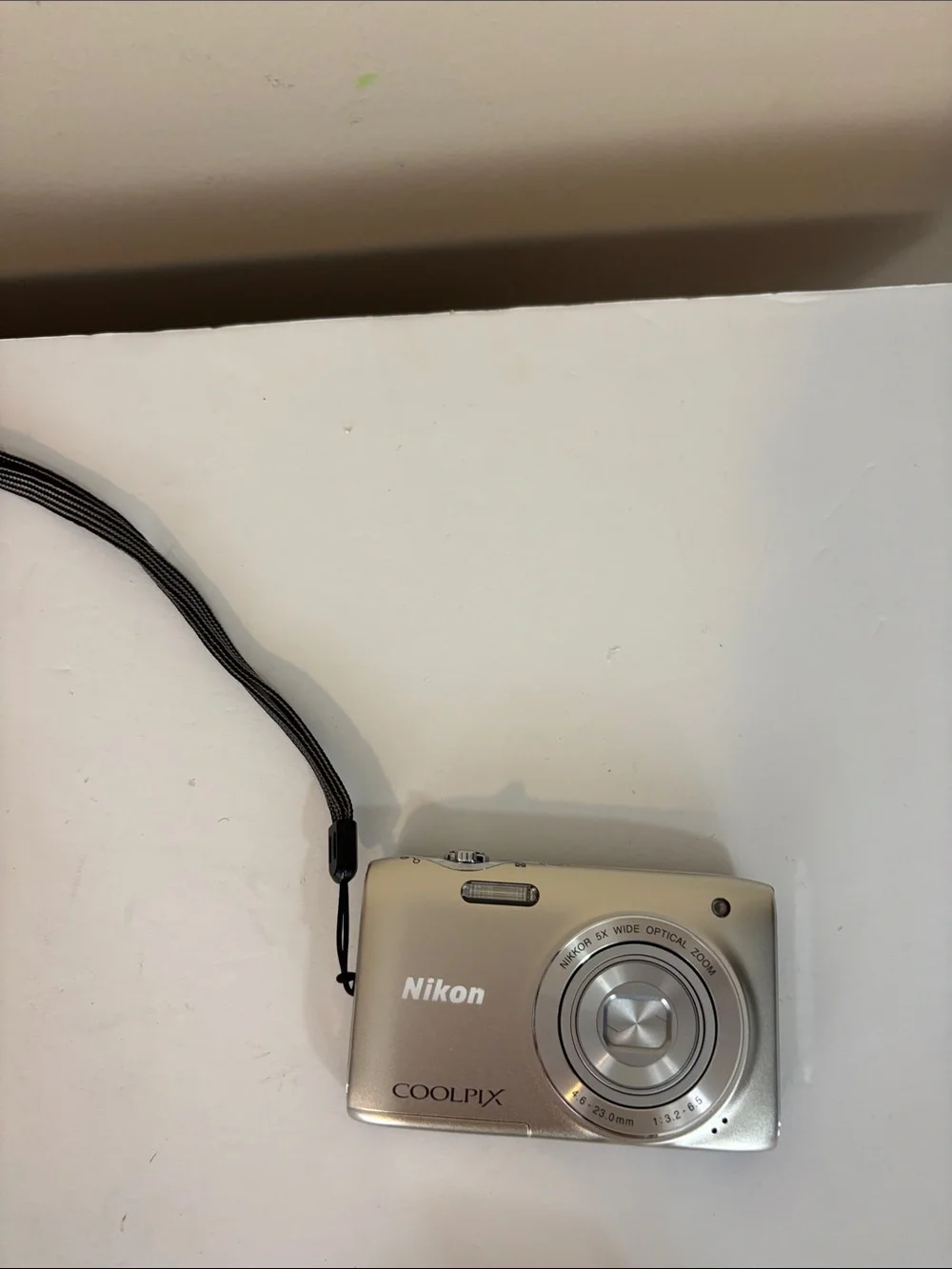 Nikon Coolpix S3100 camera with charger box and everything shown